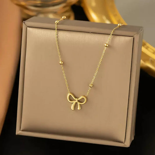 Elegant Gold Bow Pendant Necklace