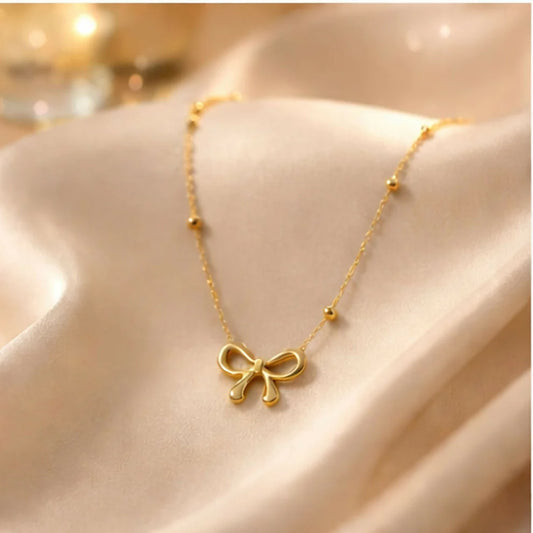 Elegant Gold Bow Pendant Necklace